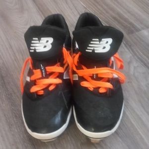 New Balance metal cleats